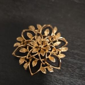 Elegant Gold Floral Brooch By SARAH COVENTRY